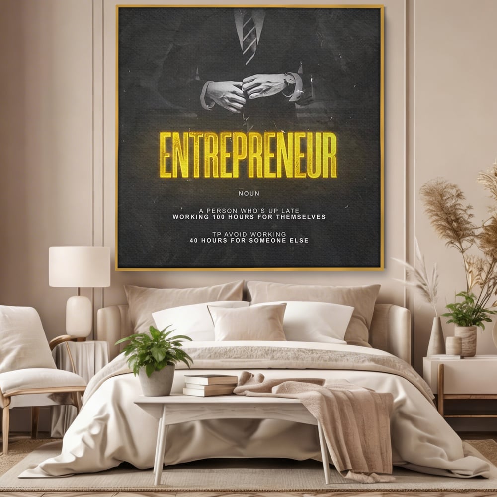 Tablou canvas cu ilustratie motivationala cu text si costum, in rama de aluminiu auriu, pe perete intr-un dormitor